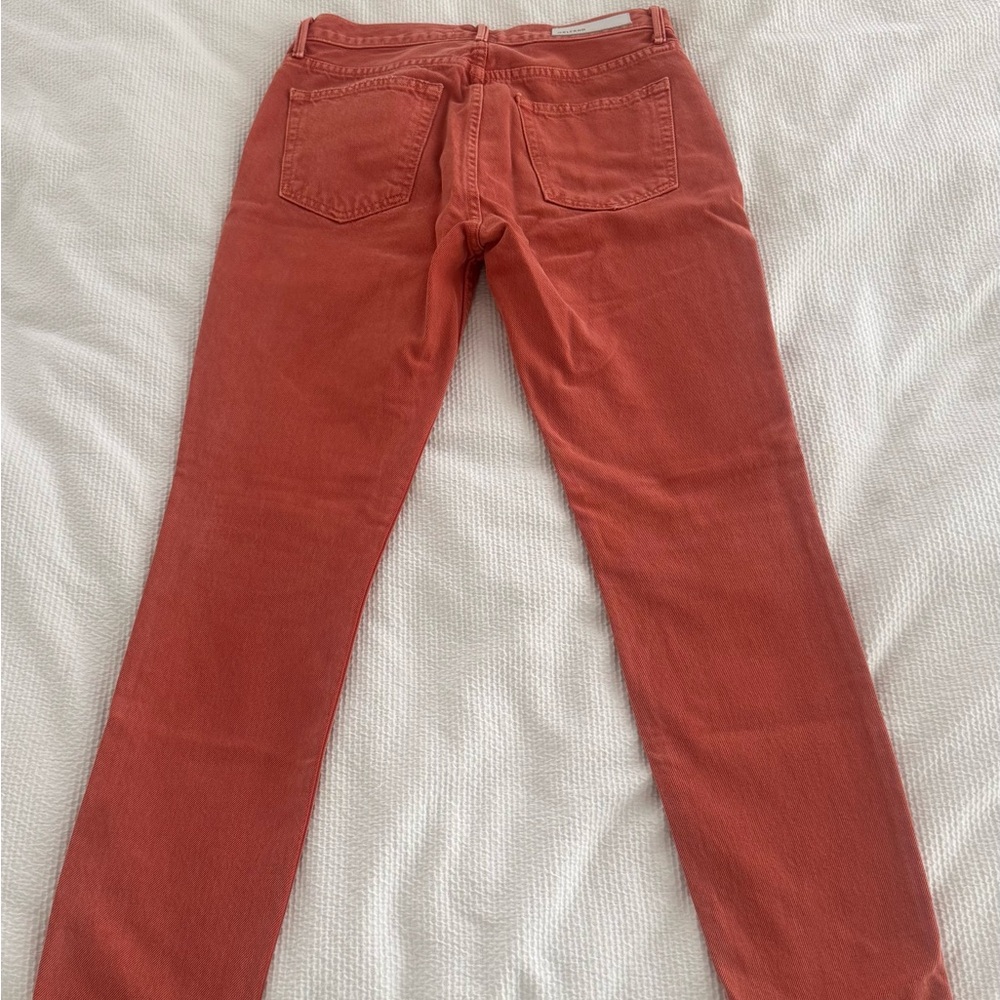 GRLFRND Skinny Orange Jeans with Bold Style
